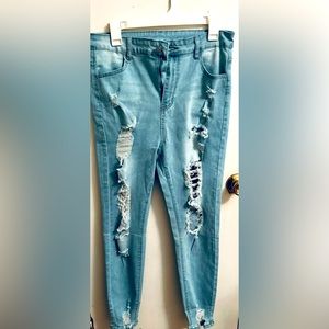 Ripped stretchy stone wash ankle jeans